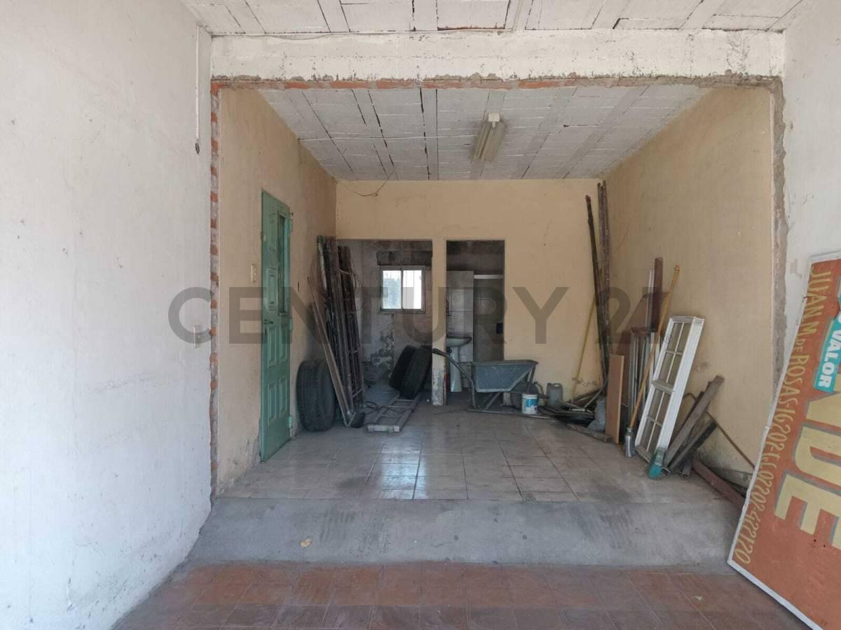 CASA A REFACCIONAR EN LOTE DE 10X30 MTS — foto 1