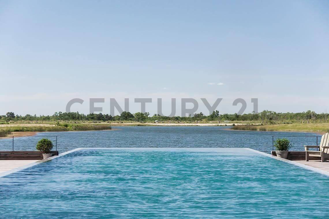 Lote al agua en EL NAUDIR con salida al Río Lujan — foto 1