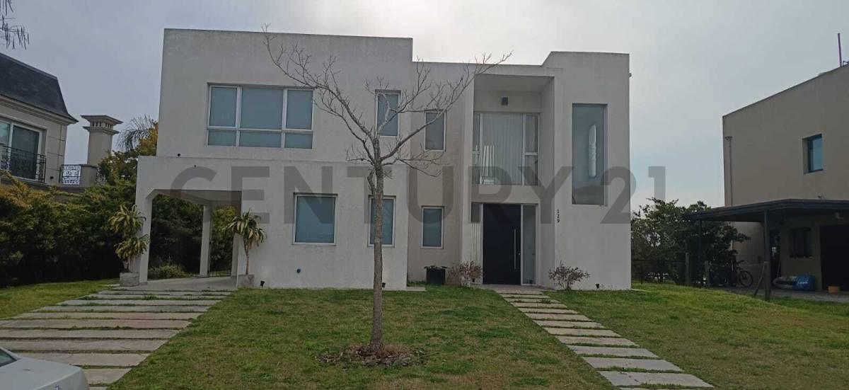 Casa en alquiler anual en Puertos del Lago Barrio Ceibos — foto 1